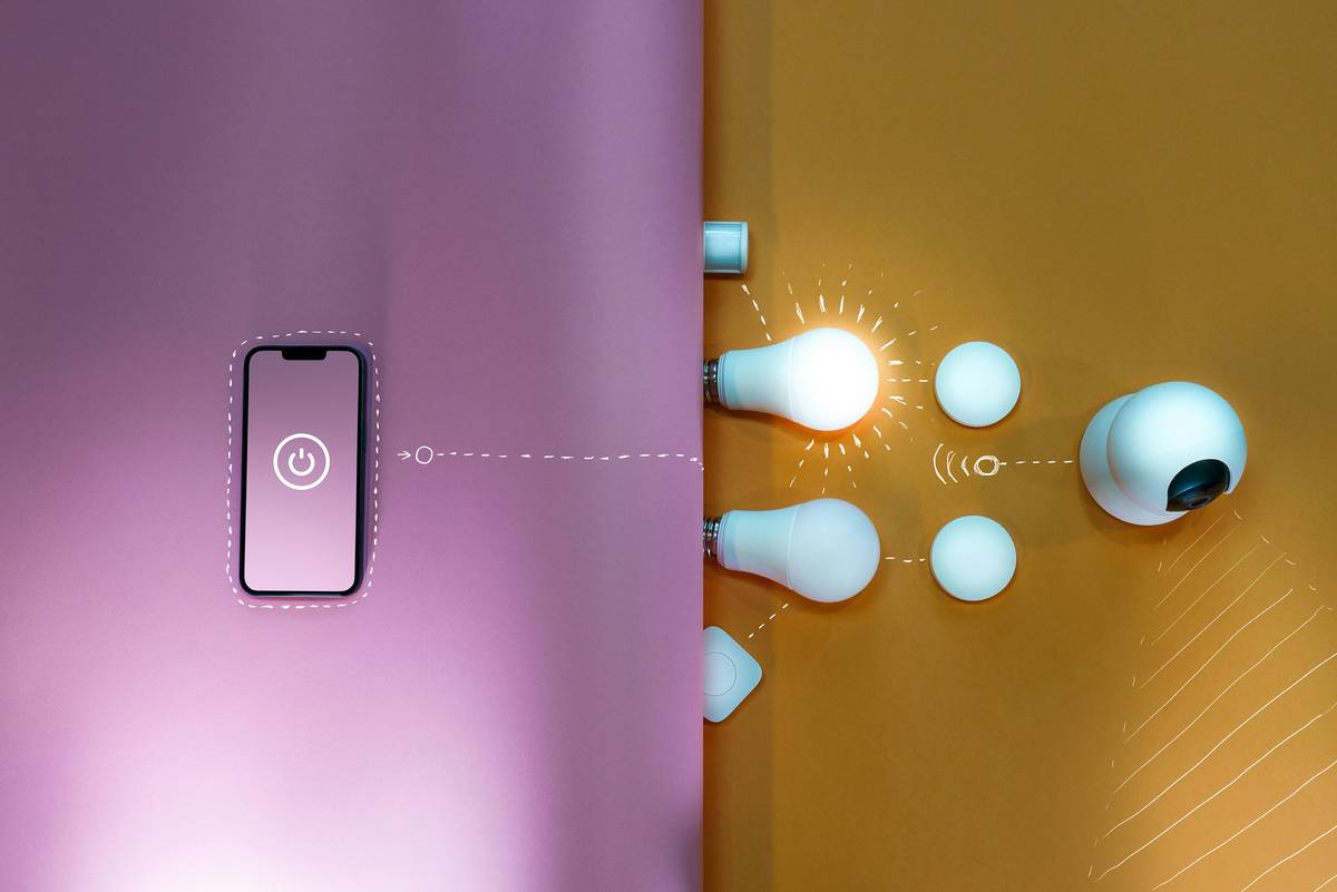 black mirror smart home mounted in modern bathroom with weather and calendar display