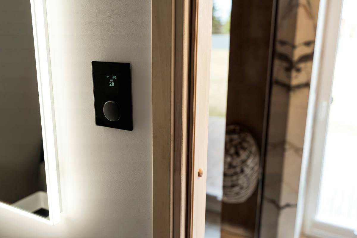 A sleek wall-mounted smart mirror displaying weather, calendar, and AI-powered skincare analysis as part of home automation smart mirror ai integration